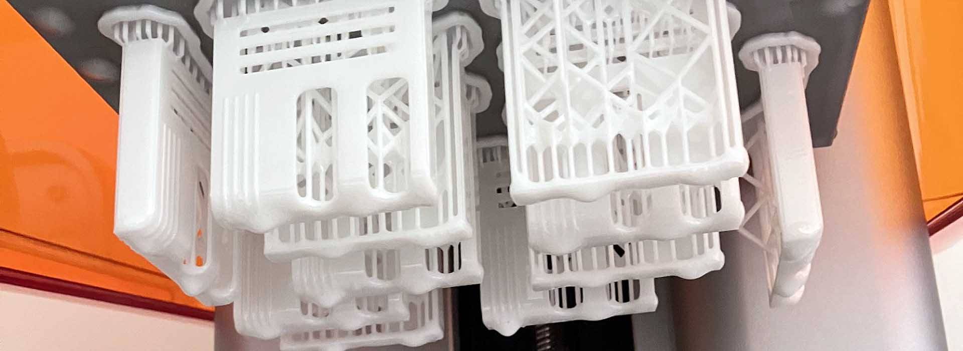 A complex prototype on a 3D printer after being printed in resin by 3D Print Precision. A complex prototype on a 3D printer after being printed in resin by 3D Print Precision.